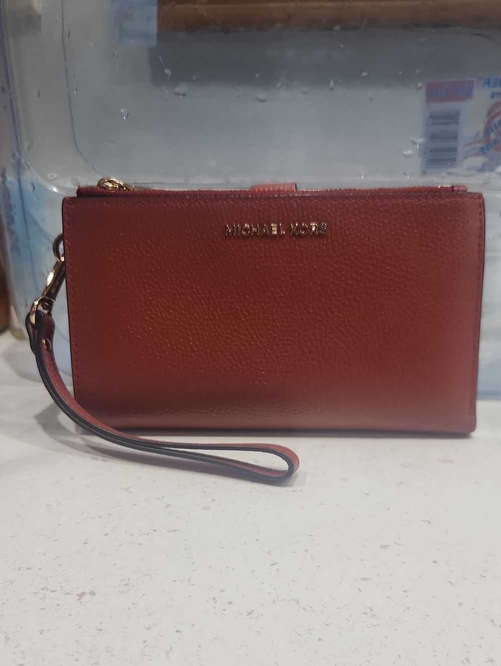 Michael Kors Brick Red Leather Wristlet with Gold Hardware